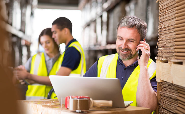 Warehouse worker learning about security